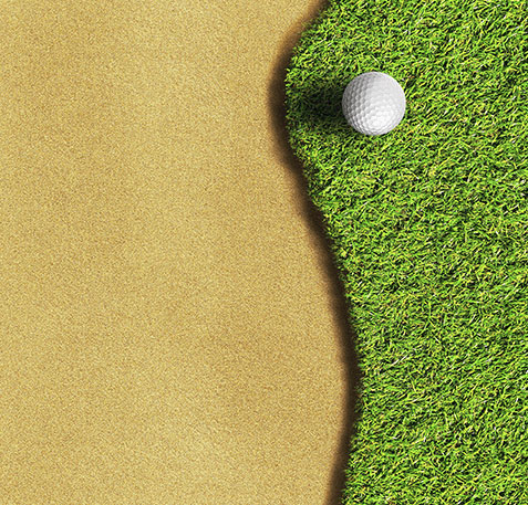 Golf ball on the edge of the green